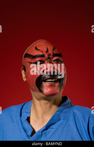 An Actor Portrays Guang Gong, Ancient Chinese General in Beijing Opera Costume, Represents Protection and Wealth Stock Photo