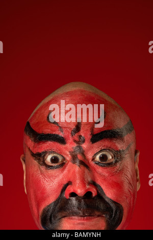 An Actor Portrays Guang Gong, Ancient Chinese General in Beijing Opera Costume, Represents Protection and Wealth Stock Photo