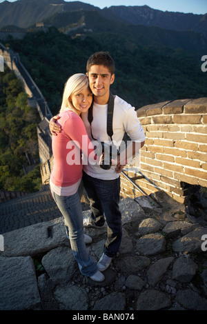 Young couple visiting the Great Wall of China Stock Photo