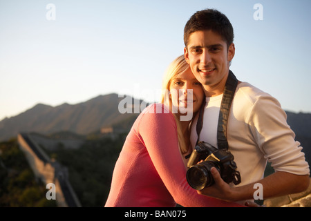 Young couple visiting the Great Wall of China Stock Photo