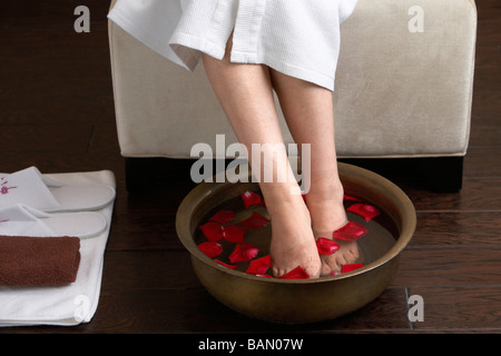 Woman's feet in a foot bath Stock Photo