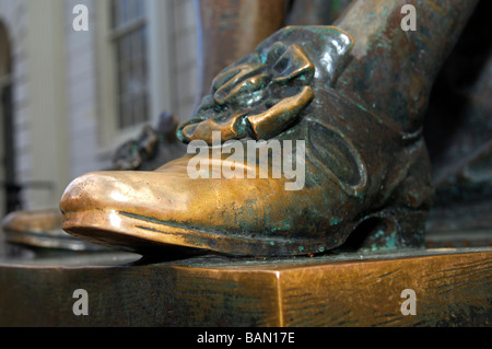 Bare left shoe at the John Harvard statue by Daniel Chester French ...