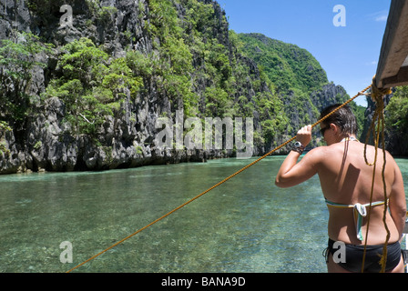 Tourists on an island hopping trip through the Bacuit Archipelago, Palawan, Philippines Stock Photo