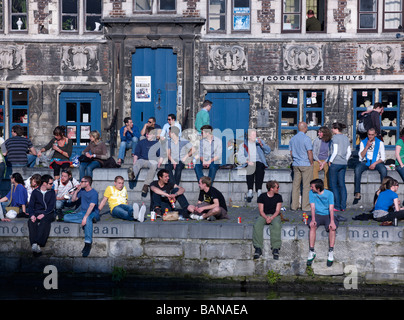 Crowds of people at the riverside of Graslei,Ghent Stock Photo