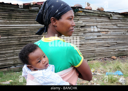 African mother and baby boy in a Township Swellendam South Africa Stock Photo