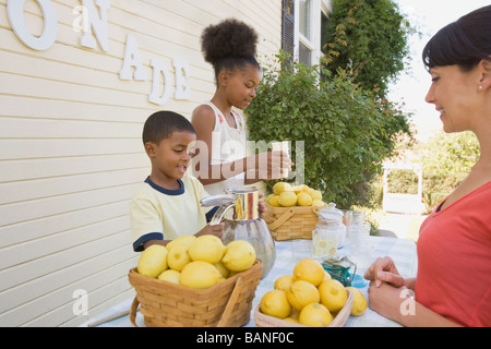 Customer at lemonade stand Stock Photo