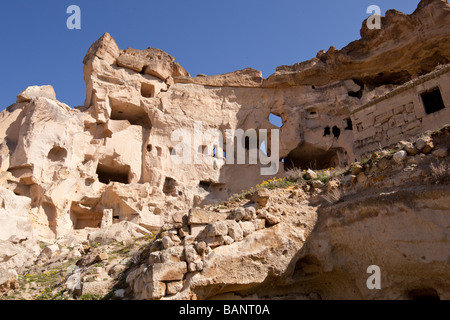 Ancient cavern homes near Goreme in Cappadocia Turkey Stock Photo ...