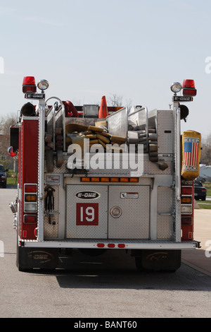 American red fire rescue truck parked in the city street from back close up of nobody vertical in the Ohio USA US hi-res Stock Photo