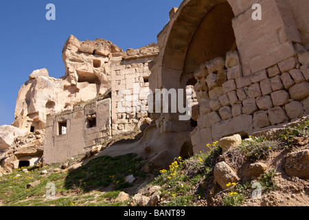 Ancient cavern homes near Goreme in Cappadocia Turkey Stock Photo