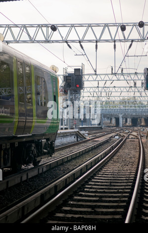 Railway tracks on a sunny day exiting from Euston Station London Stock Photo