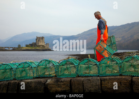 Creel or Lobster Prawn Fisherman at Loch Duich, near Eilean Donan Castle, Scotland, UK Stock Photo