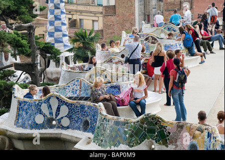 Park Güell People resting on the terrace Antonio Gaudi Architect Gracia District Barcelona Catalonia Spain Stock Photo