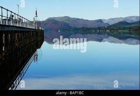 View from Pooley Bridge pier The distant high ridge line on the right is the Helvellyn range Stock Photo