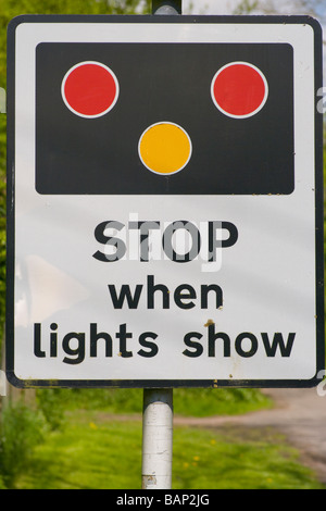 Railway Train Level Crossing Stop When Lights Show Road traffic Sign roadsign Uk Stock Photo