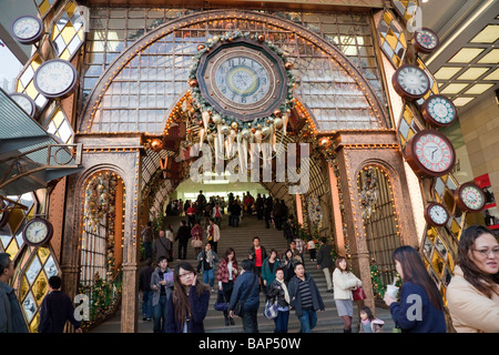 People at Harbour City Entry in Hong Kong - Entrance to Ocean Terminal, Tsim Sha Tsui, Kowloon, Hong Kong, China, Asia Stock Photo