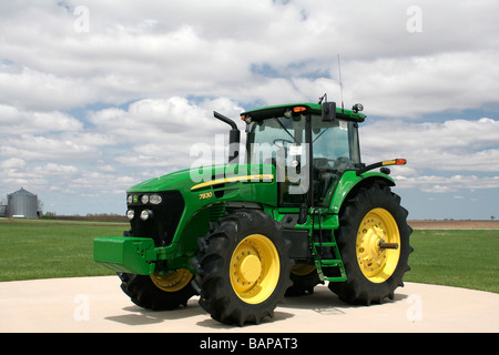 Tractor on display in front of John Deere tractor assembly plant. Tractors are manufactured here, and seen around the world. Stock Photo