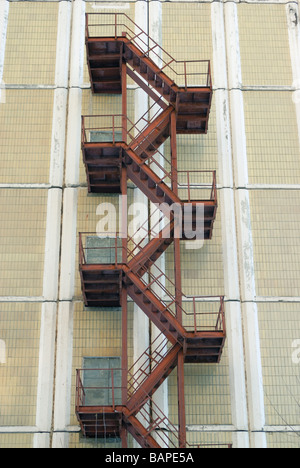 Rusty iron fire escape stairway Stock Photo