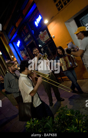 Street musicians playing in Plaza Serrano bars, Palermo Soho, Buenos Aires, Argentina Stock Photo