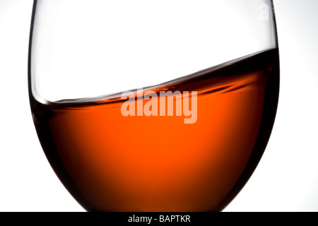 glass of rose wine swirling swirl Stock Photo