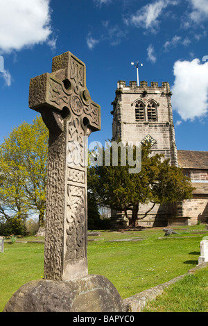 UK England Cheshire Nether Alderley St Marys Church celtic cross gravestone in the churchyard Stock Photo