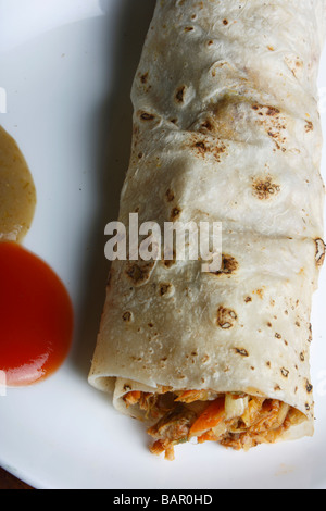 Chicken Kathi Roll is a Fast food and a snack dish from India/South Asia. Stock Photo