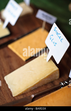 Single Gloucester cheese for sale at Stroud Farmers Market, Stroud, Gloucestershire, UK Stock Photo