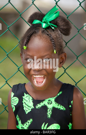 Bajan girl smiling and posing, Barbados, 'West Indies' Stock Photo