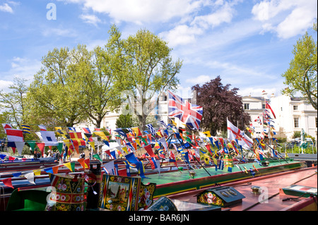 Decorated narrow boats moored on Regents Canal in 'Little Venice' during Canalway Cavalcade, London, United Kingdom Stock Photo