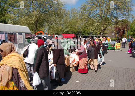 Shoppers at Wednesday's Church road market in Willesden, London, England, Uk Stock Photo