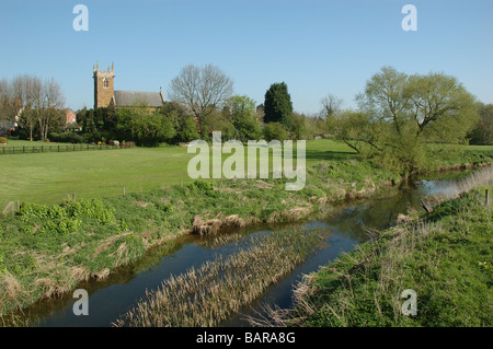 the River Wreake and Holy Trinity Church, Thrussington,Leicestershire, England, UK Stock Photo