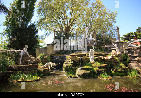 the Italian white marble statues of sea nymphs in York House Gardens Twickenham London UK Stock Photo