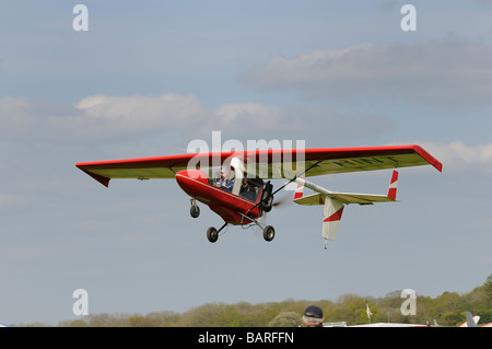 Streak Shadow Light Aircraft G-RINT takes off from Popham airfield Hampshire Stock Photo