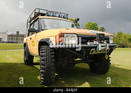 Yellow Landrover 4x4 off road vehicle Stock Photo - Alamy