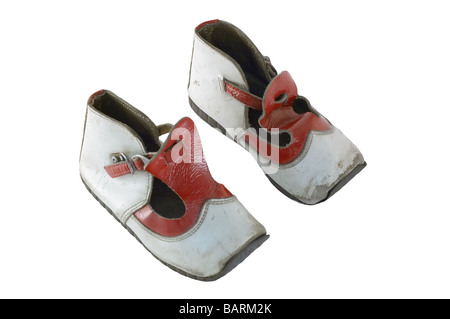 Children shoes from around 1950 isolated on white and clipping path included Stock Photo