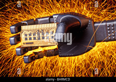 Robot hand holding circuit board with sparking background Stock Photo