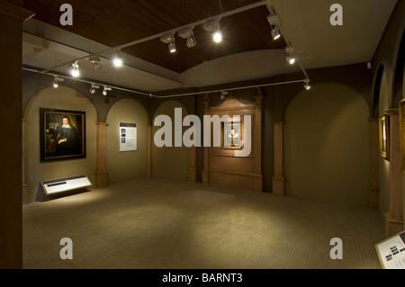 The 'Cobbe' portrait (center) of William Shakespeare in the 'Shakespeare Found' exhibition at the Shakespeare Birthplace Trust. Stock Photo