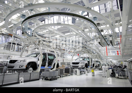 Worker on the assembly line of the VW Tiguan at Auto 5000 GmbH Volkswagen Group Wolfsburg Germany Stock Photo