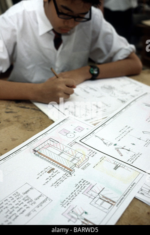 Secondary school boy working on technical drawings in the classroom Stock Photo