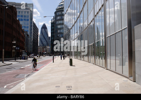 View along Norton Folgate and Bishopsgate towards Gherkin Tower City of London Stock Photo