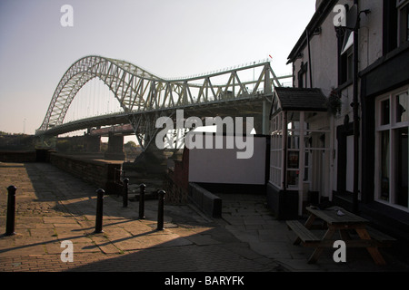 Pub in Widnes ,next to the Silver Jubilee Bridge over the River Mersey and Manchester Ship Canal at Runcorn Gap, Cheshire, UK Stock Photo