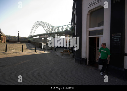 Pub in Widnes ,next to the Silver Jubilee Bridge over the River Mersey and Manchester Ship Canal at Runcorn Gap, Cheshire, UK Stock Photo