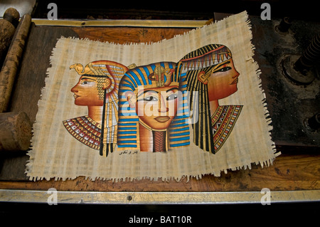 Papyrus manuscripts and paintings “Replica” for sale in a souvenir shop in Khan el-Khalili a major souk in the historic center of Islamic Cairo Egypt Stock Photo