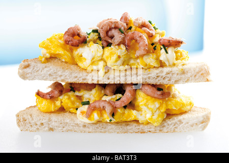 Sandwich with scrambled eggs and shrimps Stock Photo