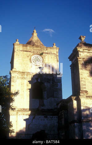 Clock tower and steeple of La Iglesia de la Inmaculada Concepcion an 18th century church in Heredia, Costa Rica Stock Photo