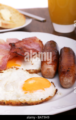 Freshly cooked breakfast with sausages and juice Stock Photo