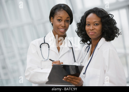 African doctors holding medical chart Stock Photo