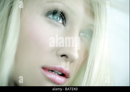 Healthy woman's face wearing make-up. Stock Photo