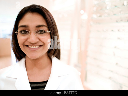 Optician wearing glasses. Stock Photo