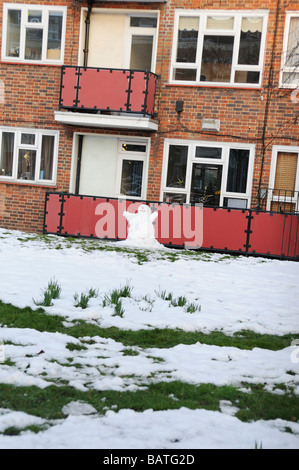 Snowman outside a block of flats Hackney,London