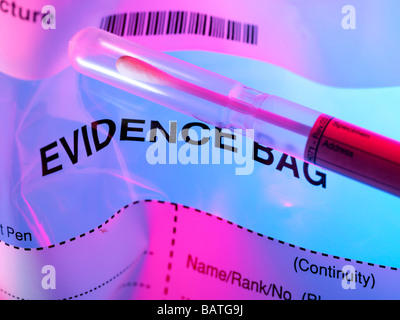 Forensic evidence. Swab sample from a crime sceneon top of a forensic evidence bag. Stock Photo